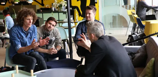 The True Cost director Andrew Morgan with producer Michael Ross engaging Danish Fashion Institute's Jonas Eder-Hansen